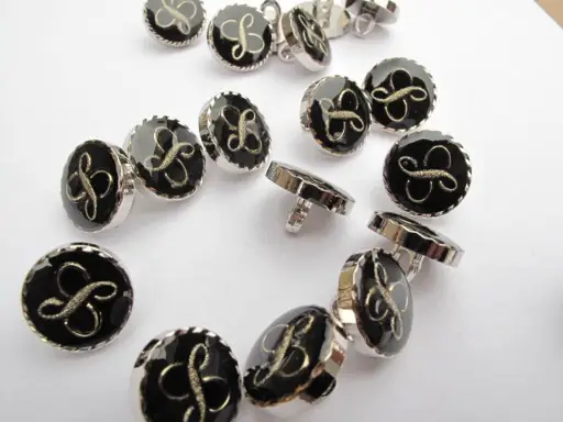 Gombík SP symboly L 16mm/striebornočierny