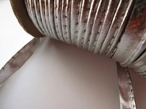 Výpustka lamé metal 10mm/strieborná