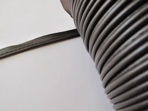 Výpustka koženková 10mm/kávová