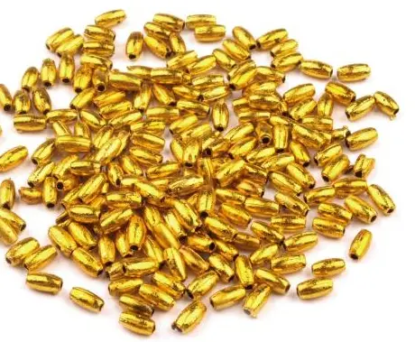 Korálky plast kovový dizajn ryža 3x6mmx 10g/zlaté