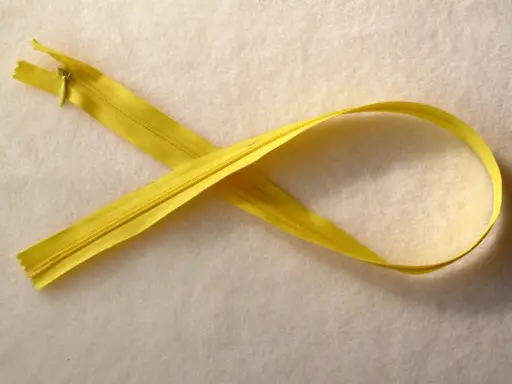 Zips skrytý polyesterový 55cm/žltý