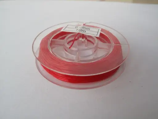 Vlasec na bižutériu silikónový 0,6mmx 10m/červený
