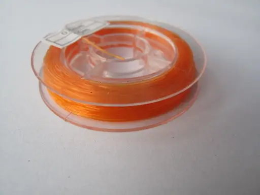 Vlasec na bižutériu silikónový 0,6mmx 10m/oranžový