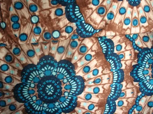 Plátno Bavlna elastické batiková bordúra a ornamenty/tyrkys