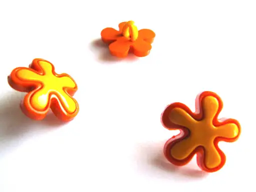 Gombík detský SP kvietok 18mm/žlto- oranžový